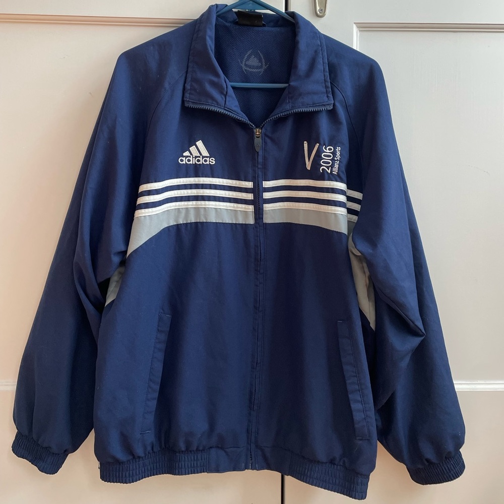 Adidas Women Navy Blue Striped
Jacket Small